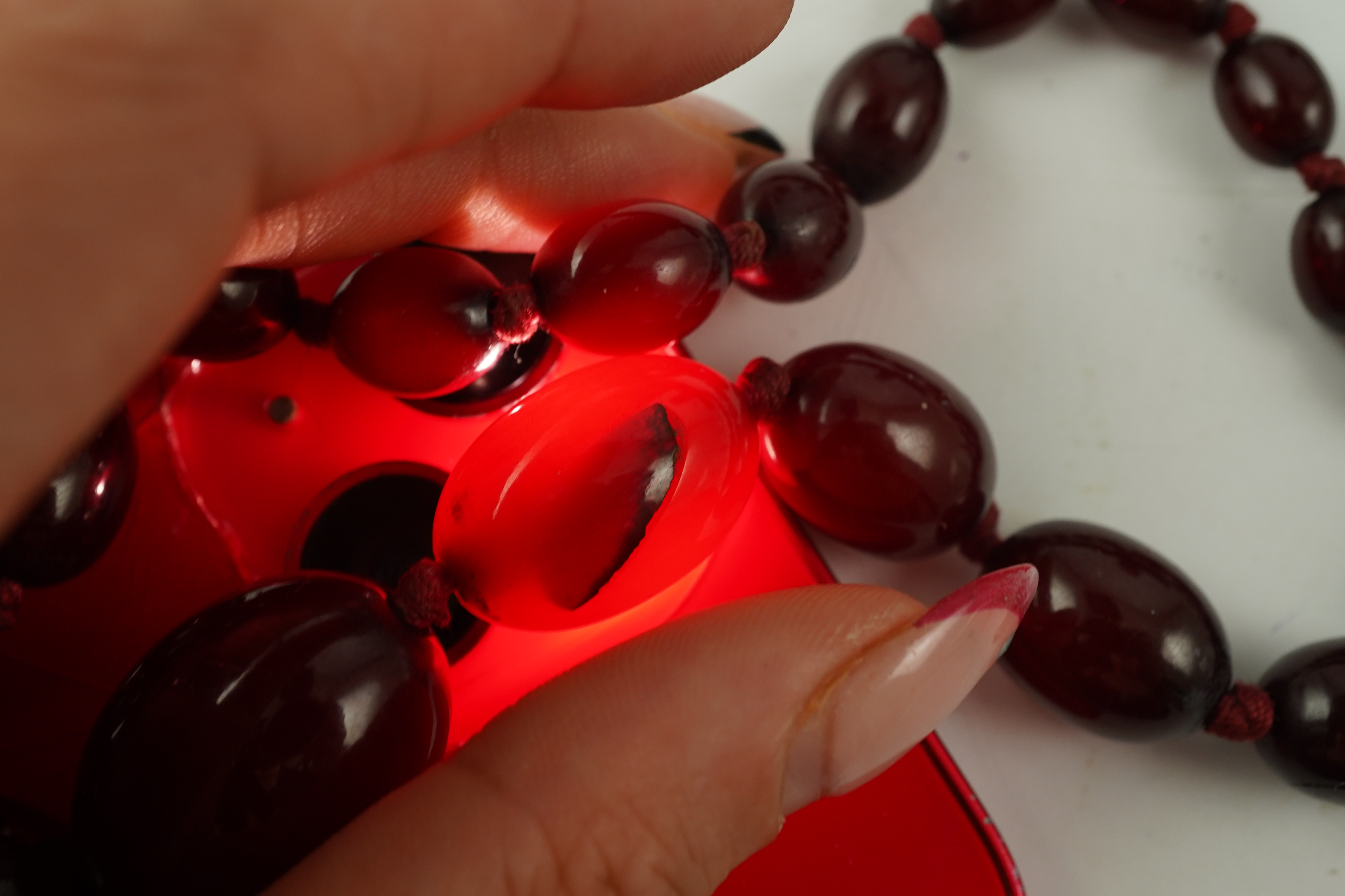 A cherry bakelite 'amber' necklace